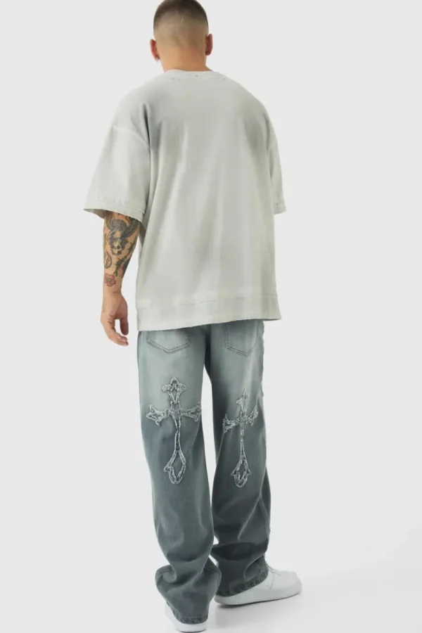 boohooMAN Baggy Rigid Cross Applique Jeans In | Denim | Going Out Denim