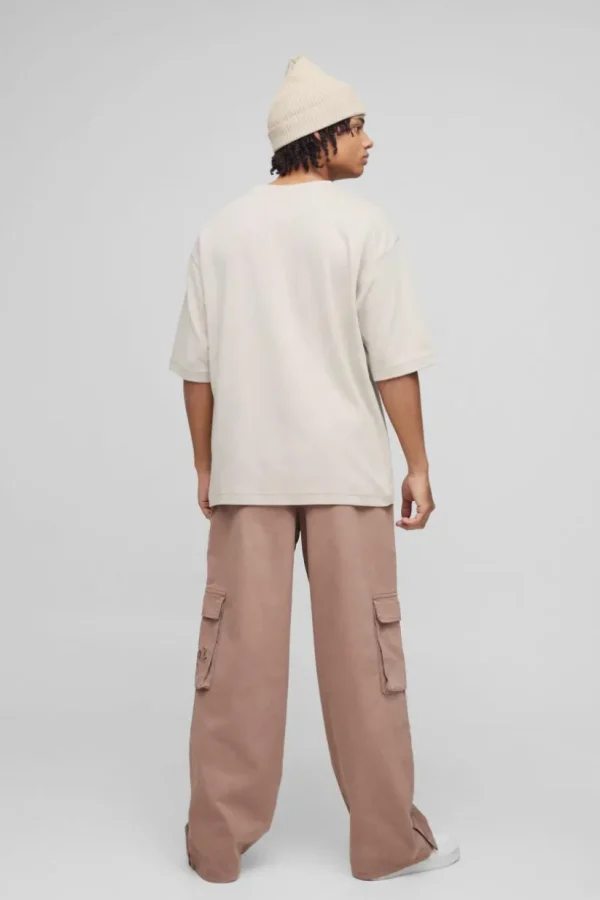 boohooMAN Elasticated Waist Baggy Brushed Twill Embroidery Cargo Trousers | Trousers | Cargo Trousers