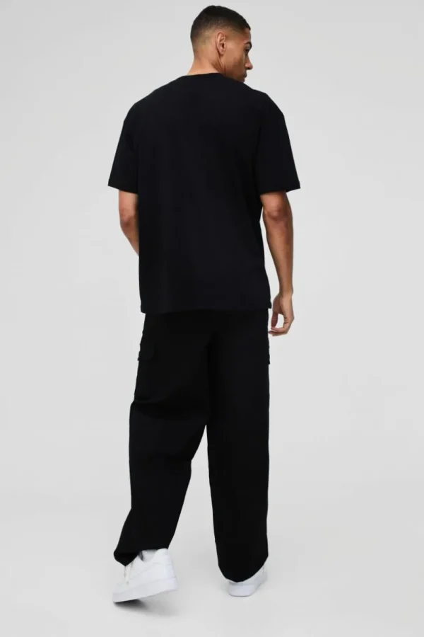 boohooMAN Elasticated Waist Baggy Seam Detail Cargo Trousers | Trousers | Cargo Trousers