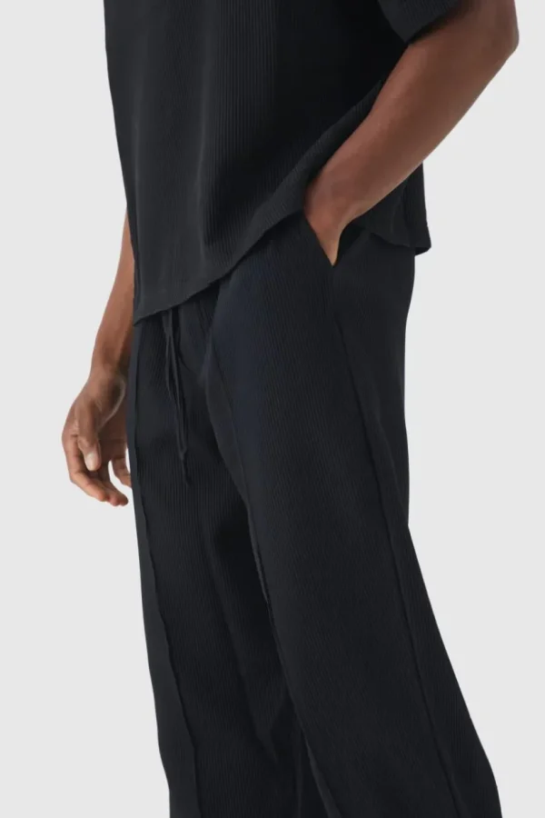 boohooMAN Elasticated Waist Relaxed Fit Pleated Trouser | Going Out | Trousers