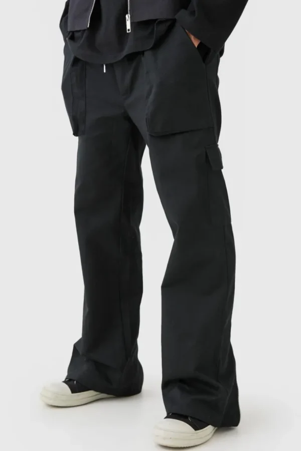 boohooMAN Elasticated Waist Zip Hem Flared Cargo Trousers | Trousers | Cargo Trousers