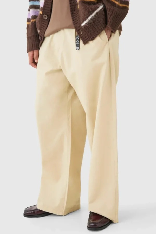 boohooMAN Fixed Waist Super Wide Leg Chino With Charm | Trousers