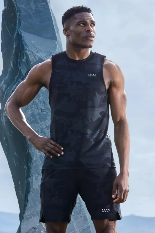 boohooMAN Man Active Camo Racer Performance Regular Fit Tank | Gym T-Shirts & Vests