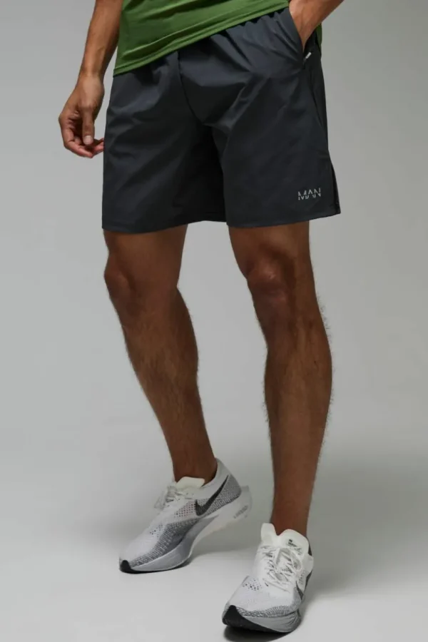 boohooMAN Man Active 7inch Perforated Grid Short | Gym Shorts | Gym Clothes