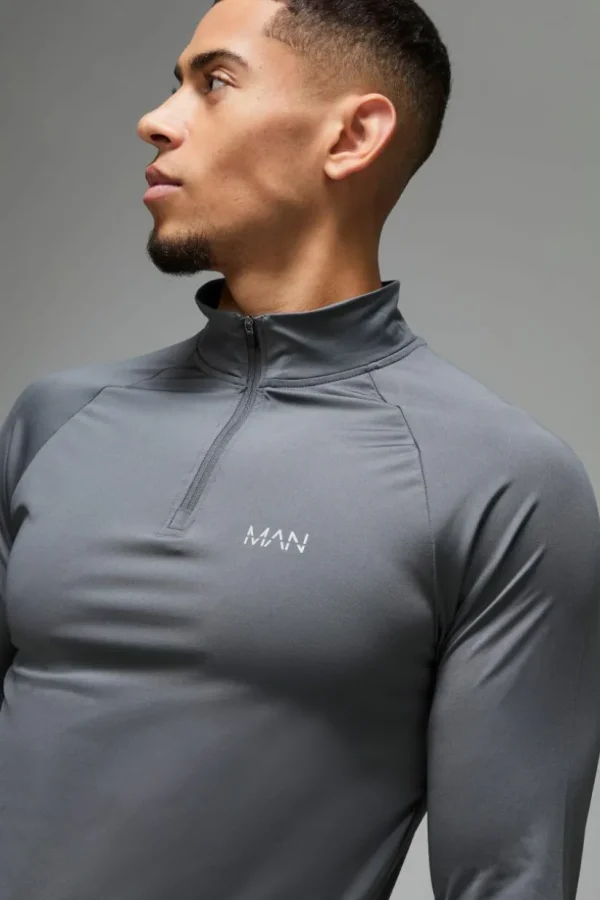 boohooMAN Man Active Muscle Fit Raglan 1/4 Zip | Gym Hoodies | Gym Clothes