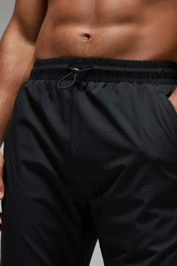boohooMAN Man Active Shower Resist Tapered Trail Jogger | Gym Joggers