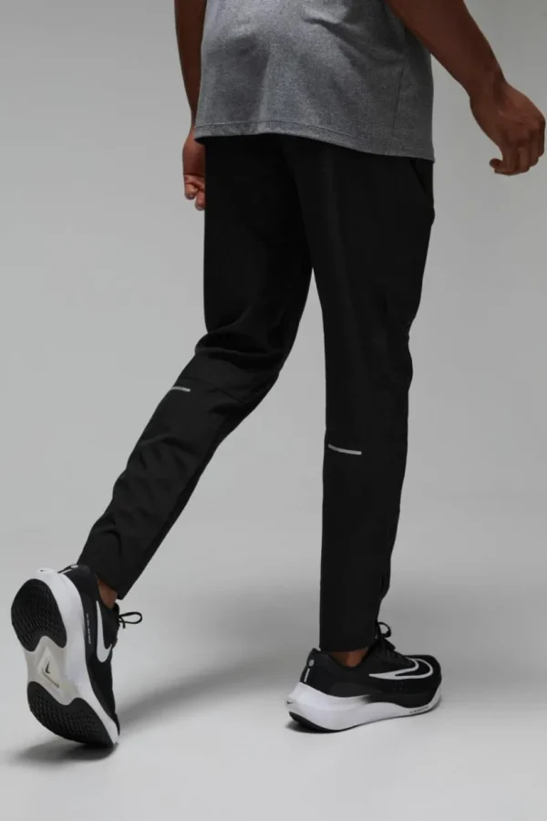 boohooMAN Man Active Stretch Woven Reflective Tapered Jogger | Gym Joggers | Gym Clothes