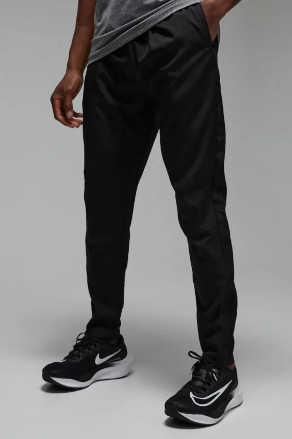 boohooMAN Man Active Stretch Woven Reflective Tapered Jogger | Gym Joggers | Gym Clothes