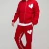 boohooMAN Oversized Boxy Hearts Puff Print Flare Gusset Print Hooded Tracksuit | Tracksuits