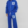 boohooMAN Oversized Boxy Limited Varsity Graffiti Zip Through Hooded Tracksuit | Tracksuits