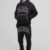 boohooMAN Oversized Worldwide Contrast Stitch Gusset Tracksuit | Tracksuits