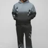 boohooMAN Plus Oversized Boxy Applique Cross Spray Wash Hooded Relaxed Flare Tracksuit | Tracksuits