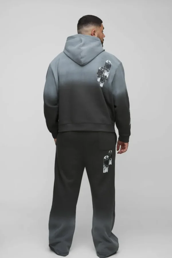 boohooMAN Plus Oversized Boxy Applique Cross Spray Wash Hooded Relaxed Flare Tracksuit | Tracksuits