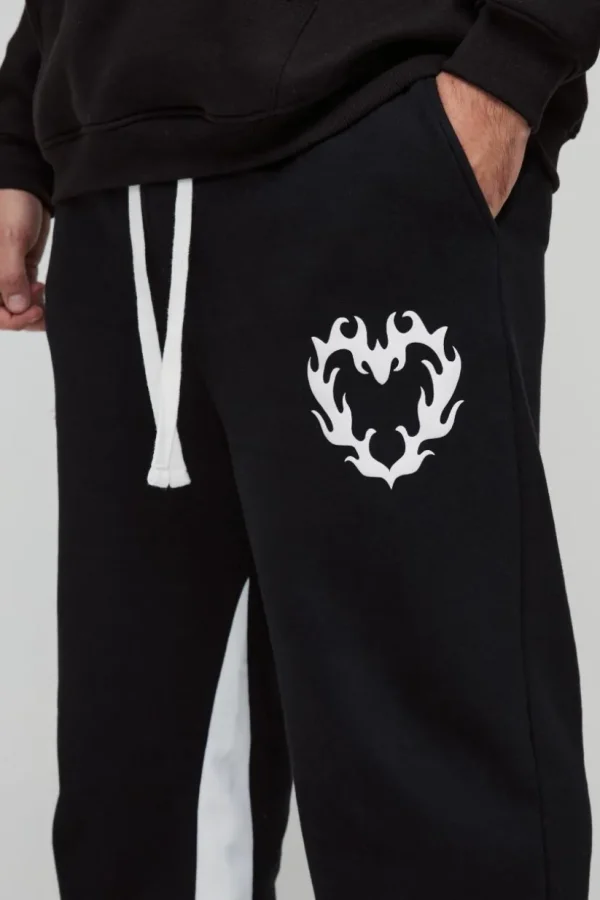 boohooMAN Plus Relaxed Flare Cold Hearted Puff Print Gusset Jogger | Joggers