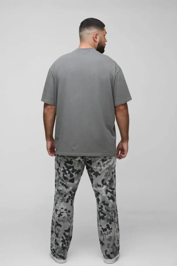 boohooMAN Plus Self Applique Gusset Detail Camo Slim Fit Flared Trousers | Trousers