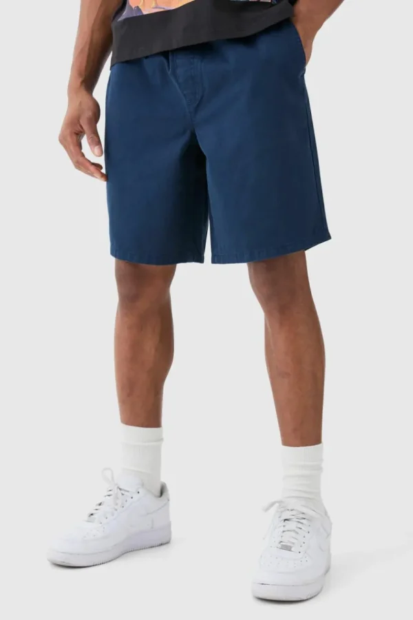 boohooMAN Relaxed Fit Elasticated Waist Chino Shorts in | Trousers | Shorts