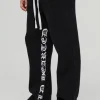 boohooMAN Relaxed Flare Gothic Gusset Print Jogger | Trousers | Joggers