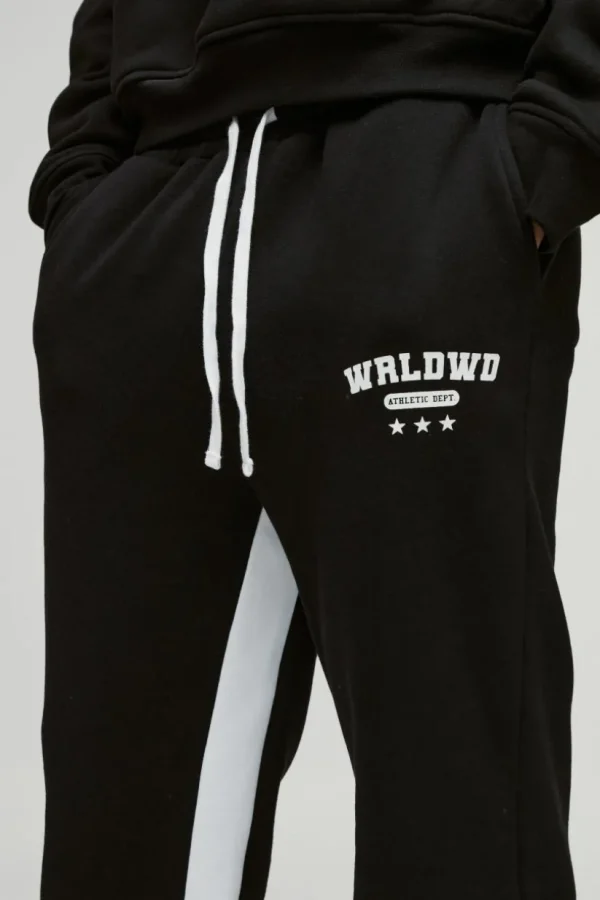 boohooMAN Relaxed Flare Worldwide Star Gusset Jogger | Joggers