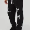 boohooMAN Relaxed Split Hem Heart Jogger | Joggers