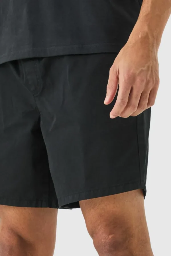 boohooMAN Shorter Length Relaxed Fit Elasticated Waist Chino Shorts in | Trousers | Shorts