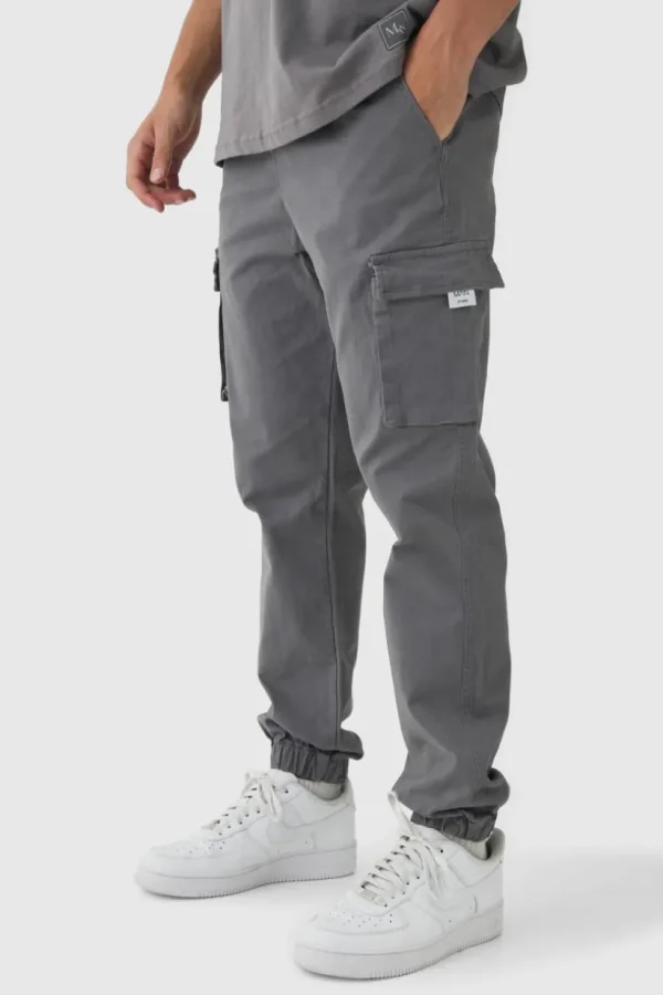 boohooMAN Slim Fit Elasticated Waist Woven Tab Cuffed Cargo Trousers | Trousers | Cargo Trousers