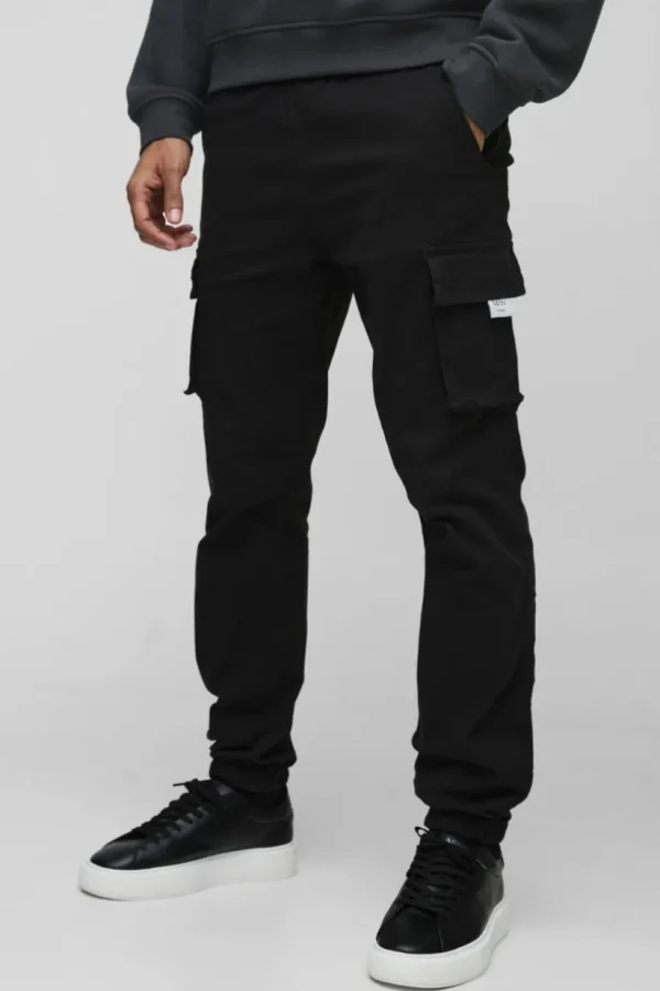 boohooMAN Slim Fit Elasticated Waist Woven Tab Cuffed Cargo Trousers | Trousers | Cargo Trousers