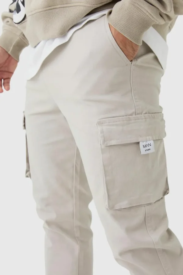 boohooMAN Slim Fit Elasticated Waist Woven Tab Cuffed Cargo Trousers | Trousers | Cargo Trousers