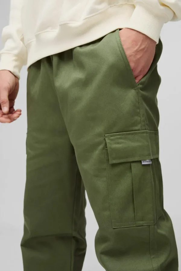 boohooMAN Slim Fit Elasticated Waist Woven Tab Cuffed Cargo Trousers | Trousers | Cargo Trousers