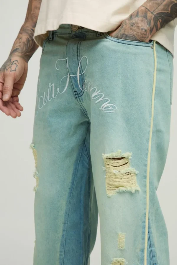 boohooMAN Tall Crotch Embroidered Distressed Gusset Flared Jeans | Denim | Going Out Denim