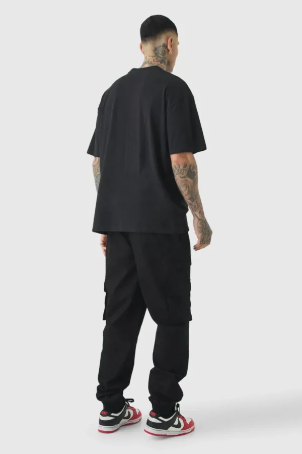 boohooMAN Tall Cuffed Hem Woven Tab Cargo Trousers In | Trousers