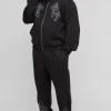 boohooMAN Tall Oversized Boxy Cross Embroidered Zip Through Hooded Tracksuit | Tracksuits