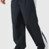 boohooMAN Tall Side Panel Track Pants in | Trousers