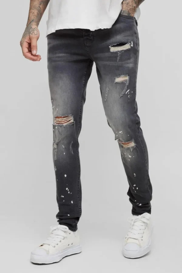 boohooMAN Tall Skinny All Over Ripped Bleached Paint Splatter Jeans | Denim | Going Out Denim