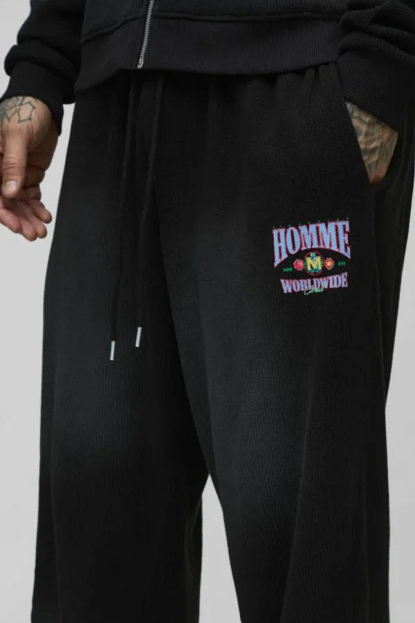 boohooMAN Tall Spray Wash Waffle Graphic Oversized Jogger | Joggers