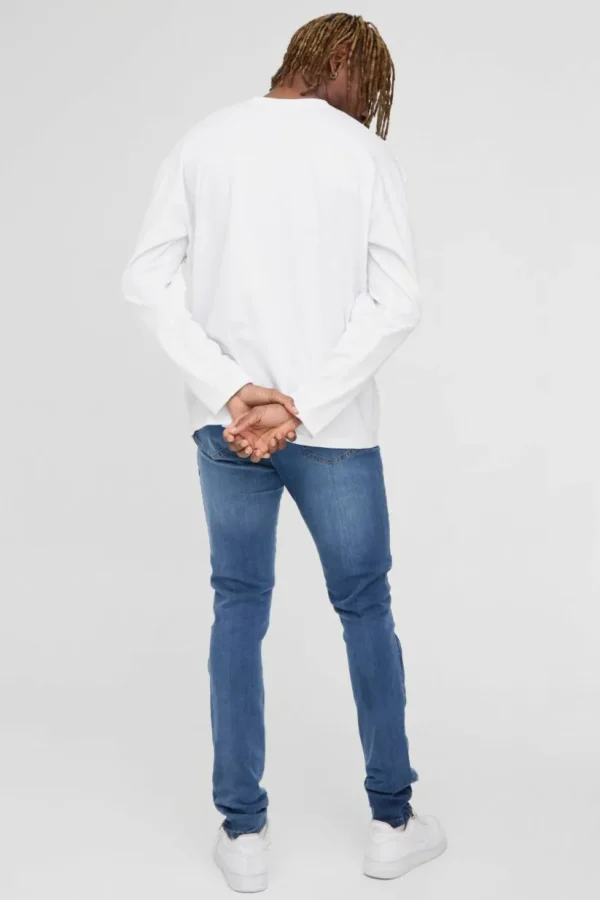 boohooMAN Tall Stretch Skinny Zip Hem Ripped Jeans | Denim | Going Out Denim