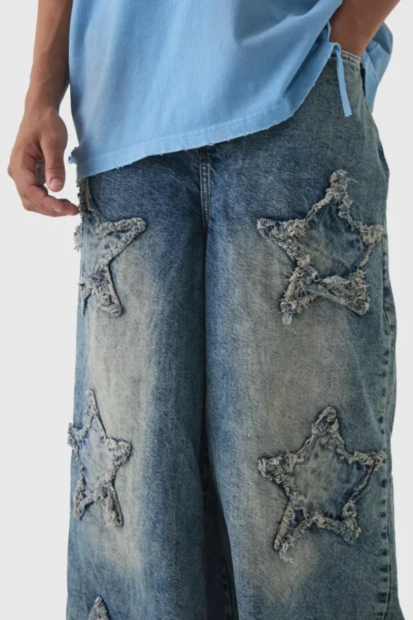 boohooMAN Wide Leg Rigid Star Distressed Applique Jeans | Denim | Going Out Denim